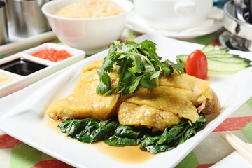 Hainanese chicken rice  with sauce and soup  