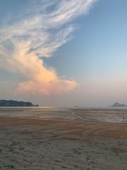 Sea sunset beach. Low tide beach. Travel Thailand. Sunset on the low tide beach in Thailand. Sea, sky and beach. Travel concept. Holiday in tropic paradise.