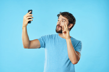 man looking through binoculars