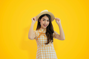 Beauty girl happy joy posing model on yellow studio background