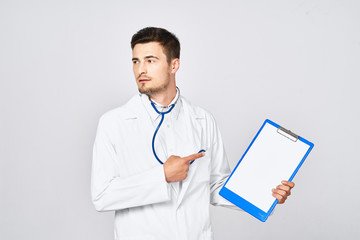 young doctor with clipboard