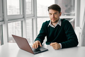 businessman working on laptop in office