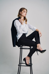 business woman sitting on a chair