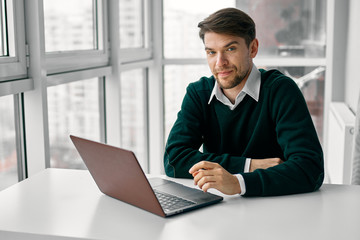 businessman working on laptop in office