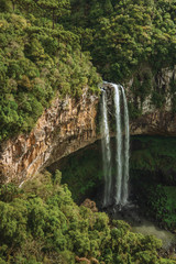 Detail of Caracol waterfall falling from a cliff