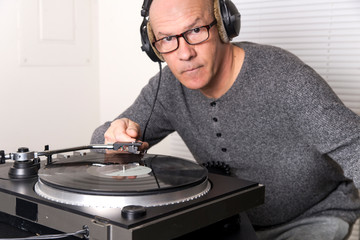 music fan listens to records