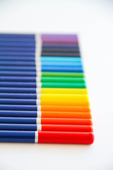 Fototapeta premium Color pencils on a white background