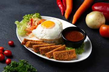 Hot Spicy Crispy Fried Chicken Fillet with Curry and egg