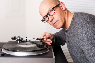 music fan listens to records