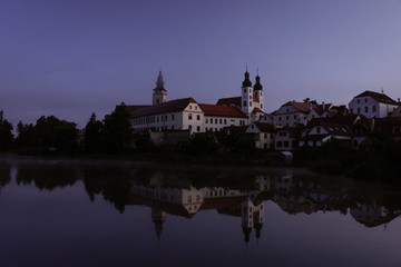 Telc village at sunrise along the waterfront