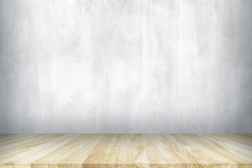 Wood table top with concrete wall background. Used for product placement or montage.