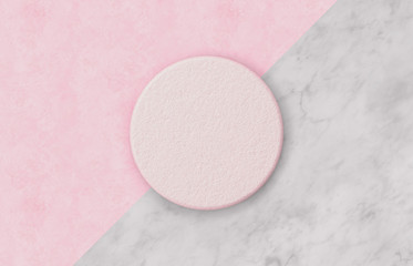 Empty pink cylinder box on Duotone background with marble stone texture for product display. Minimal spring summer concept. Flat lay. Top view.
