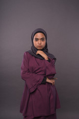 Portraiture of Muslim Girl wearing hijab.Studio Shot.