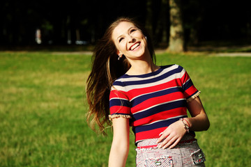 Fototapeta premium Portrait of a beautiful young woman smiling