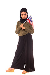 Happy young Malaysian girl holding Malaysia Flag isolated over white background.Independence Day concept.