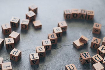 Close up of wood cube letter word of Leader and GOAL. Idea of motivation and inspiration in business success and corporate management strategy or vision. Leadership lead teamwork to reach achievement