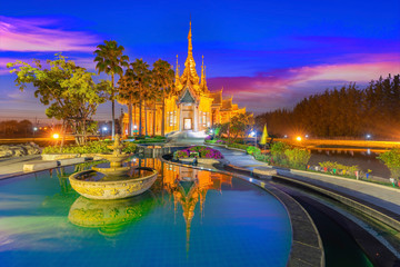 Fototapeta premium Buddhist temple with reflection on water landmark of Nakhon Ratchasima Province, Thailand