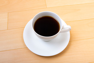 白いカップに入ったコーヒー