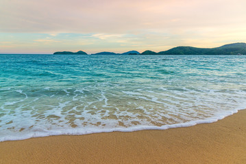 Beach sunset or sunrise with colorful of cloud sky and sunlight