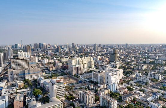 City view of the gigantic and densely populated capital of Thailand, Bangkok with its many residential and commercial skyscrapers and sprawling urban neighborhoods 