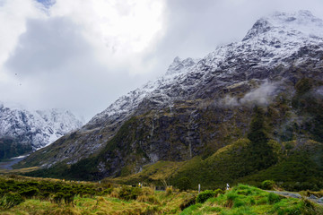 Fototapeta na wymiar Lake, mountains, trees, sky, clouds in New Zealand