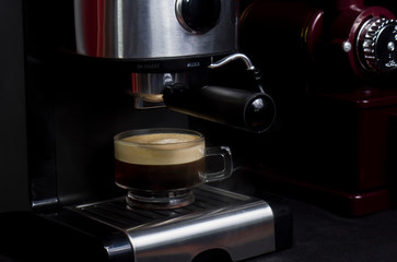 Hot espresso in clear coffee Making espresso in a clear glass coffee cup