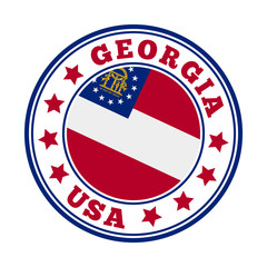 Obraz premium Georgia sign with state flag in a round logo, symbolizing travel and pride.