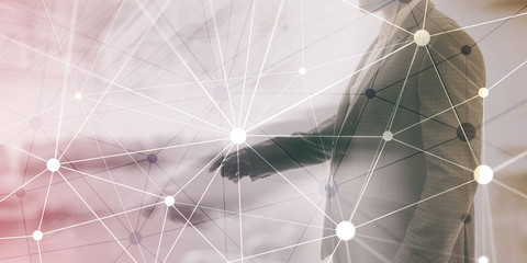 Blockchain network on blurred skyscrapers background. Financial technology and communication concept.