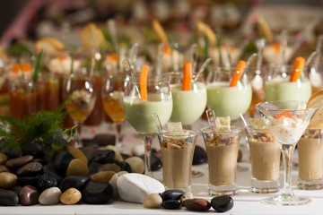 Tasty appetizers served in glass jars