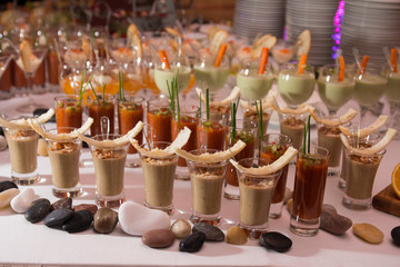 Tasty appetizers served in glass jars