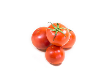 A few tomatoes on a white background.