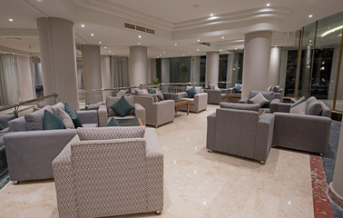 Interior design of lobby seating area in luxury hotel