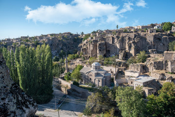 Naklejka premium View of St. Gregory's Church (Buyuk Kilise Camii Mosque) in Monastery Valley Or Manastir Vadisi, Guzelyurt, Aksaray Province, Cappadocia, Turkey
