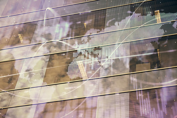 Forex chart on cityscape with tall buildings background multi exposure. Financial research concept.