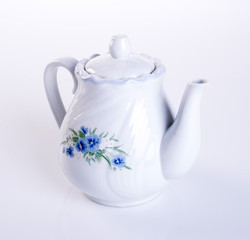 tea pot or ceramic teapot on a background new.