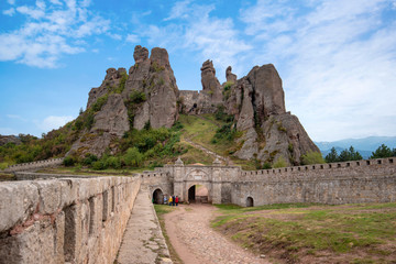 Beautiful landscape with bizarre rock formations. Stone stairs leading to the amazing rock formations and walls of a medieval fortress in Belogradchik, northwest Bulgaria. Panorama