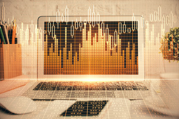 Forex Chart hologram on table with computer background. Double exposure. Concept of financial markets.