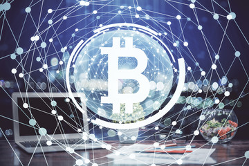 Double exposure of blockchain theme hologram and table with computer background. Concept of bitcoin...
