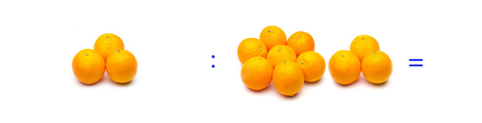 operación simple de división matemática entre naranjas; cálculo matemático