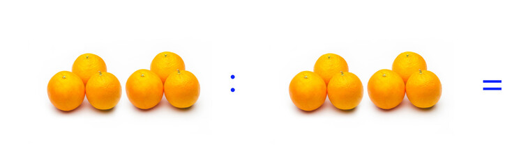 División sencilla entre naranjas, cálculo matemático de división.