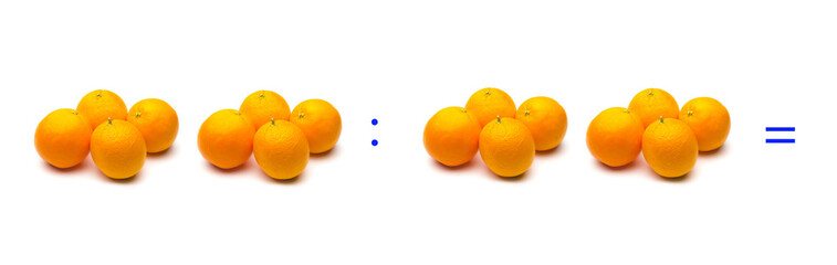 División sencilla entre naranjas, cálculo matemático de división.