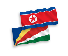 Flags of North Korea and Seychelles on a white background