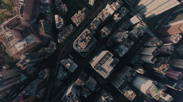 Aerial view city central park, trains, buildings and skyscrapers in New York during the day under blue skies. Best New York aerial shot. Wide shot on 4K RED camera.