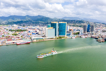 Aerial view of city of Port of Spain, the capital city of Trinidad and Tobago. Skyscrapers of the...
