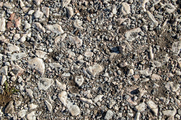 texture of cracked and rough asphalt road