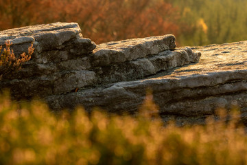 Fototapeta premium Stone texture, rock in sunset, Ostas
