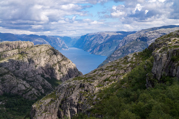 Fototapeta na wymiar Hiking road to cliff Preikestolen in fjord Lysefjord, Norway