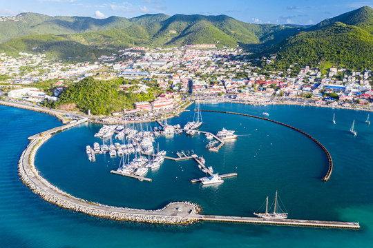 Arial view of Marigot, the main town and capital in the French Saint Martin, sharing the same island with dutch Sint Maarten. Fort St. Louis on a hill, yachts and a circular breakwaters of the marina