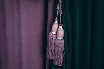 fabric in tassel drapery, selective focus, film and grain photo
