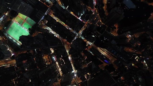 AERIAL. Top view of Hong Kong city at night time.